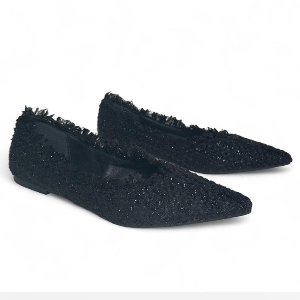 Women’s black tweed fabric pointed toe flats with fringed edges. Size 7